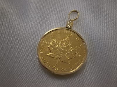 K18ペンダントトップ　K24コイン【新潟中央店】 新潟県新潟市にあるザ・ゴールド 新潟中央店（※新潟上近江店に移転いたしました）の画像1